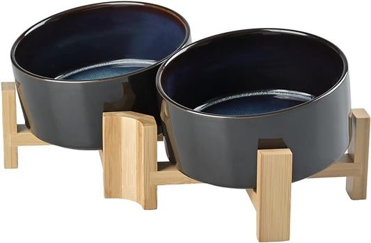 SPUNKYJUNKY 15° Slanted Ceramic Dog and Cat Bowl with Wooden Stand, Tilted Bulldog Food and Water Bowl No Slip Non-Spill for Cats Medium Dogs Big Face Pets 28.7 OZ (3.6 Cups, Starry Blue × 2)